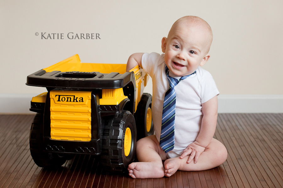 baby with dump truck