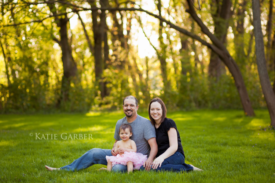 baby girl with mom and dad