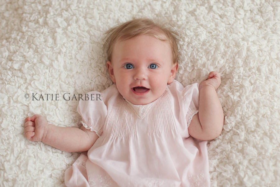 baby girl smile from above