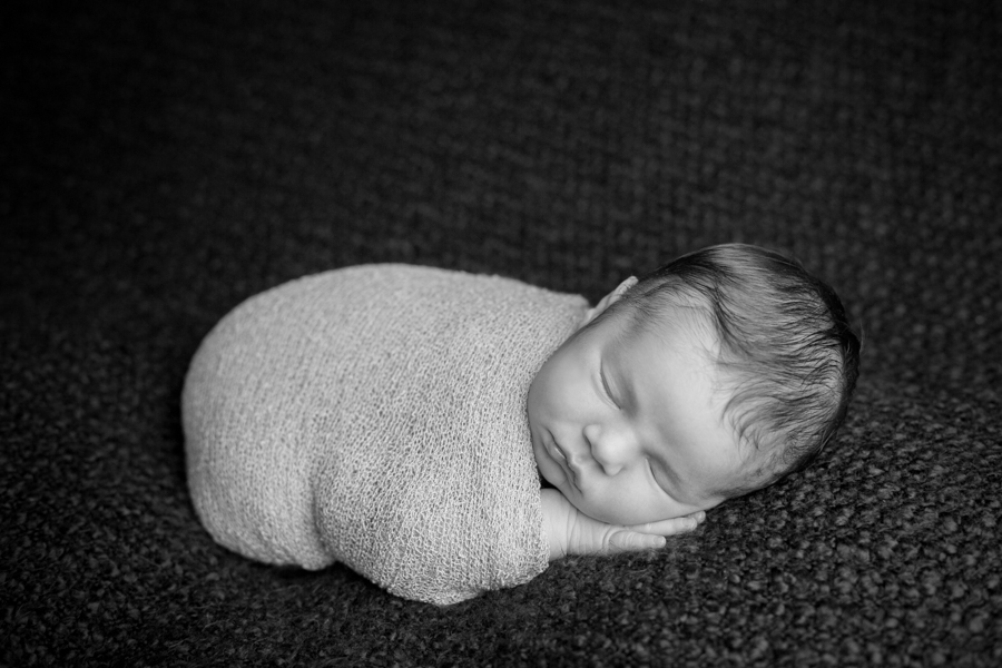 newborn baby wrapped boy sleeping